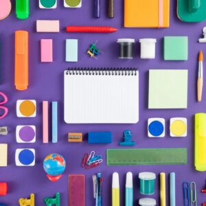 School Supplies on Purple Background