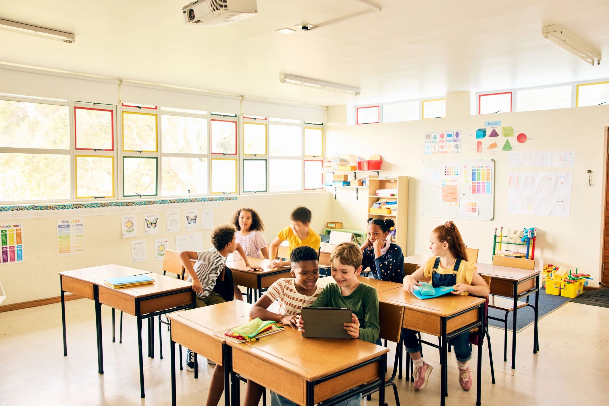 Elementary school students working together in a classroom