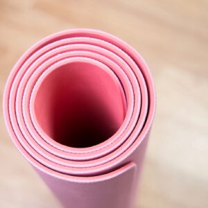 Close-up of Rolled Up Pink Yoga Mat