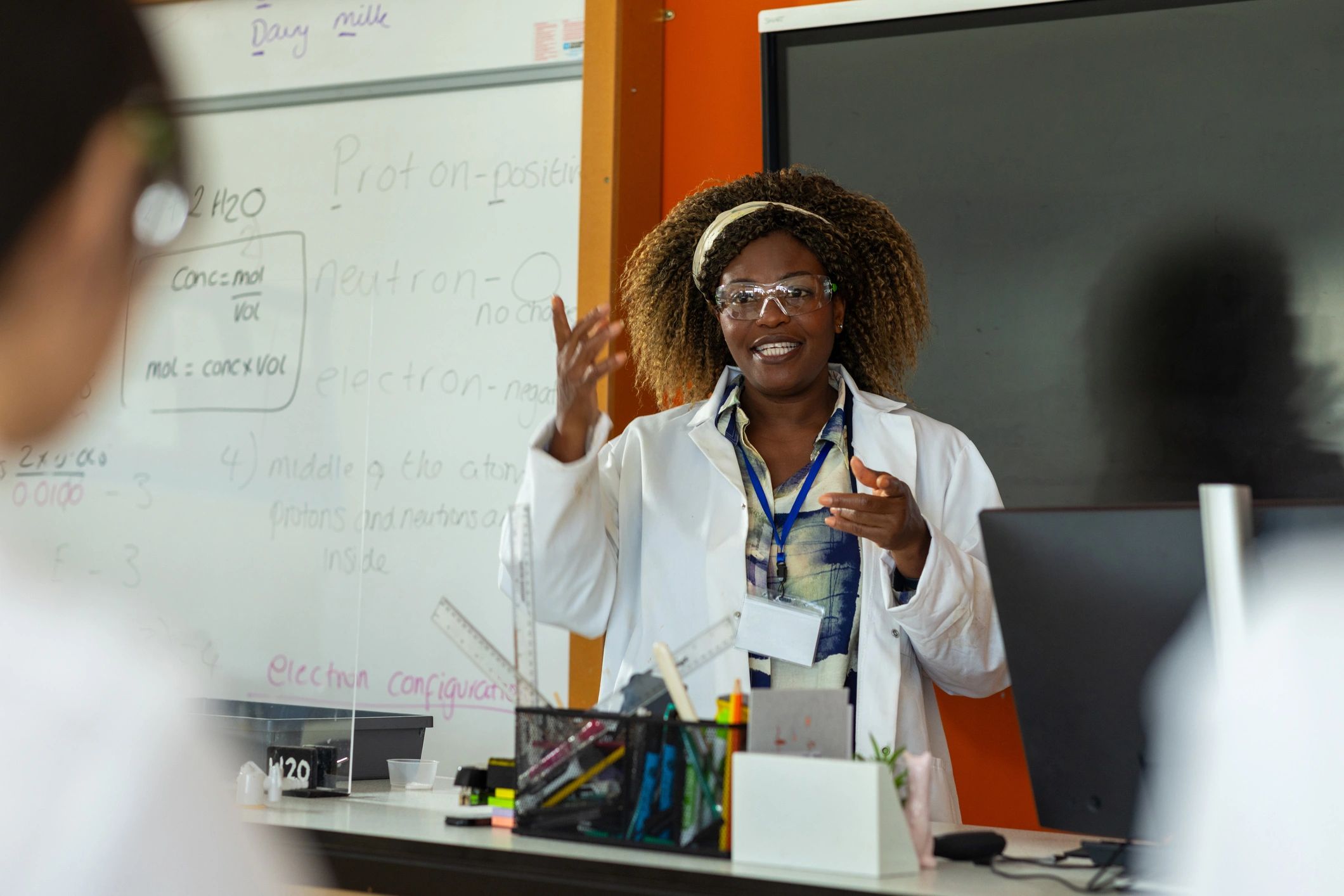 Teacher leading a classroom lesson