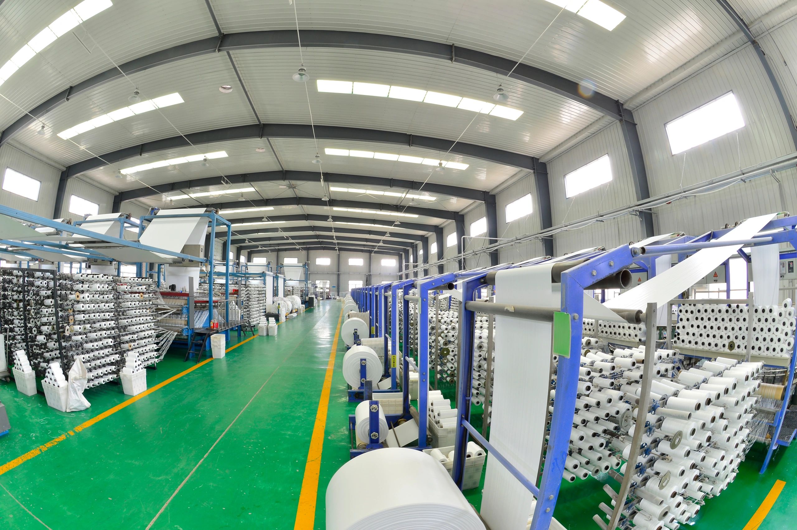 Commercial printing production equipment in a professional print facility