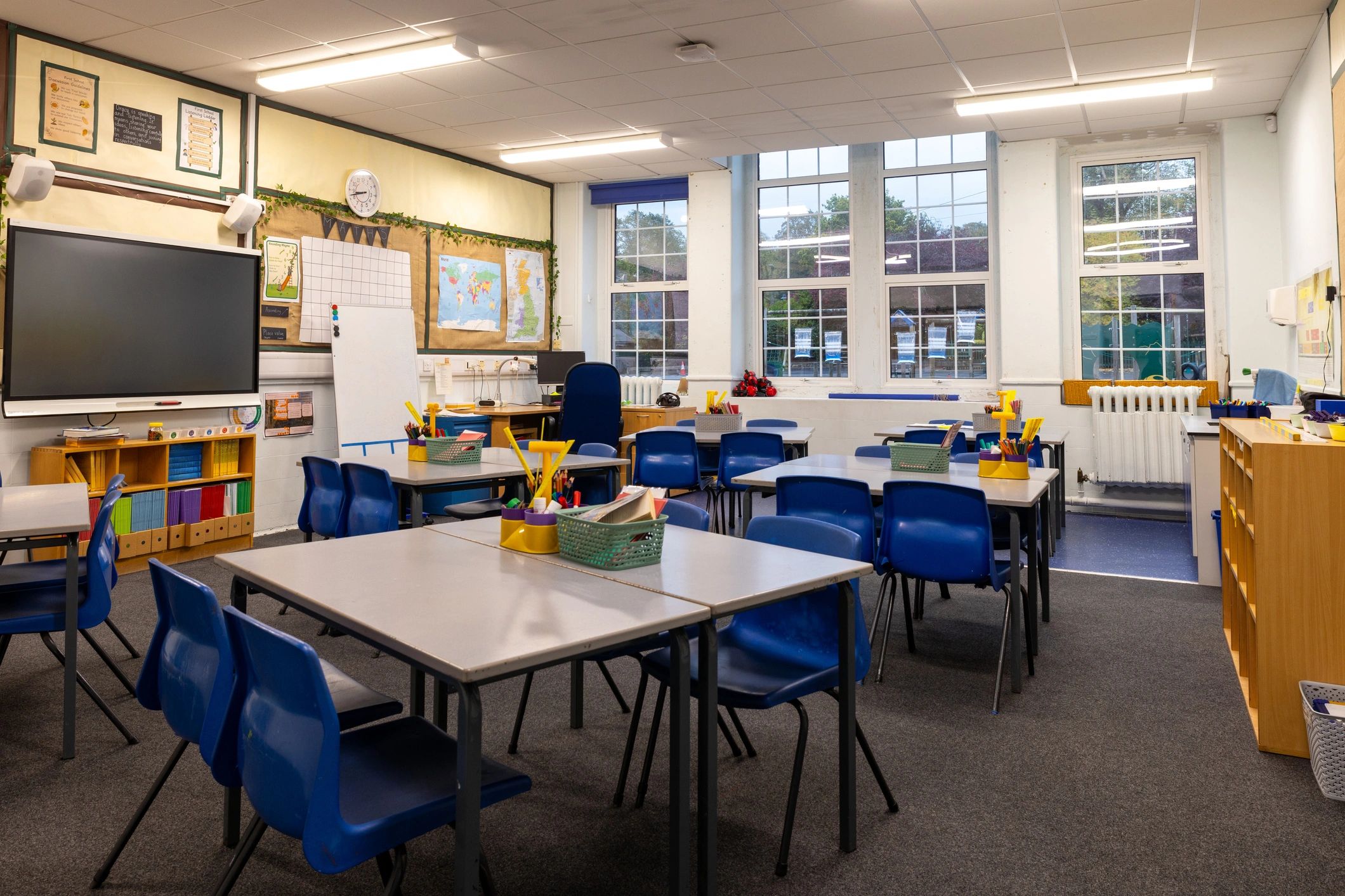 Organized classroom with desks and school supplies