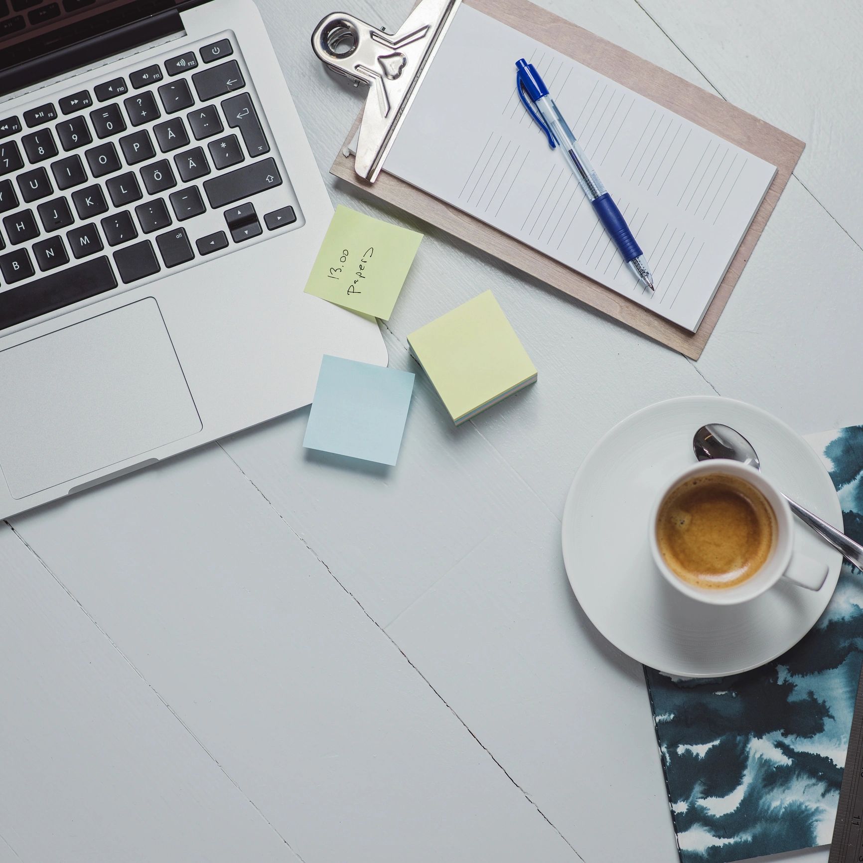 Office desk supplies arranged neatly on a clean surface