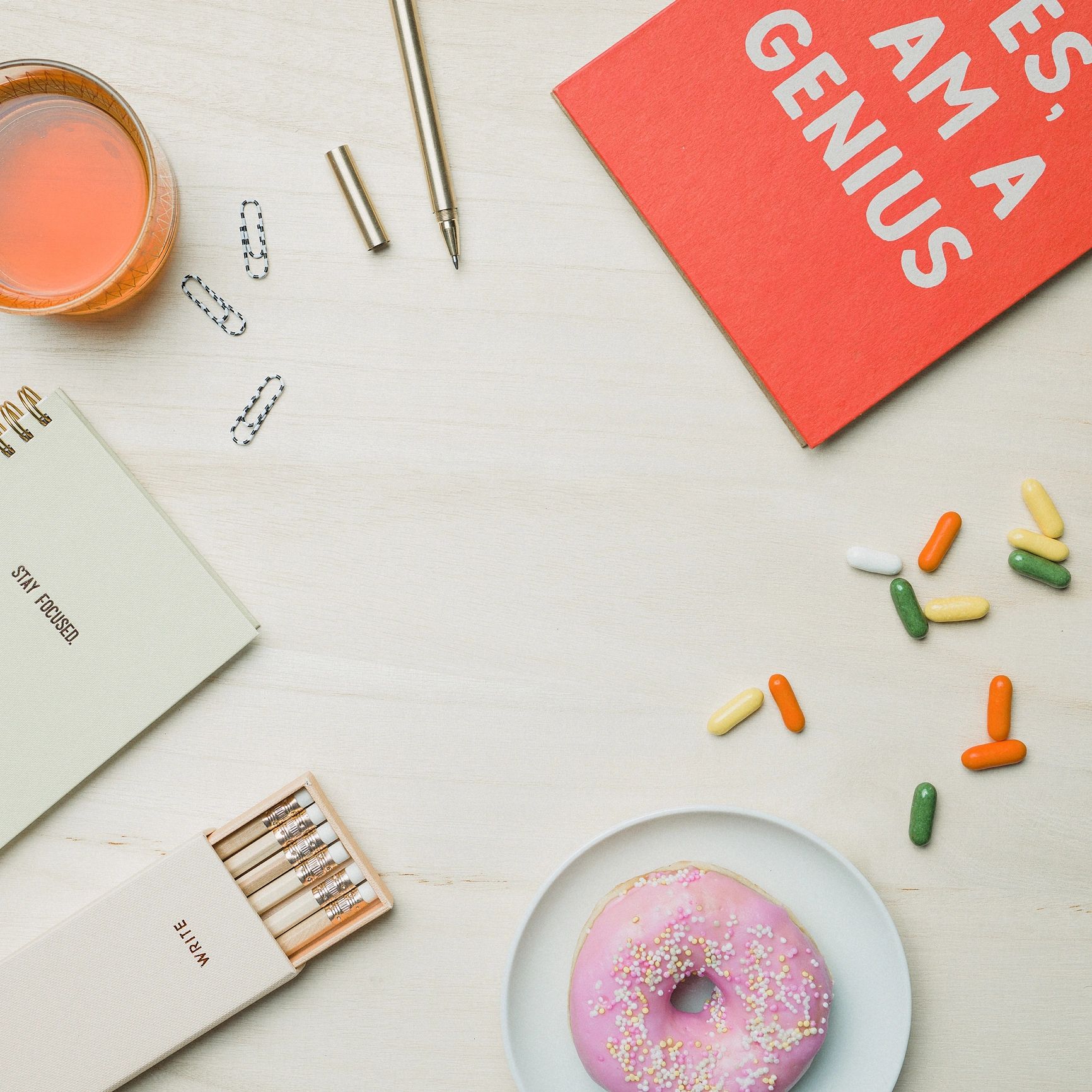 Notebook pencils and office stationery on a clean surface